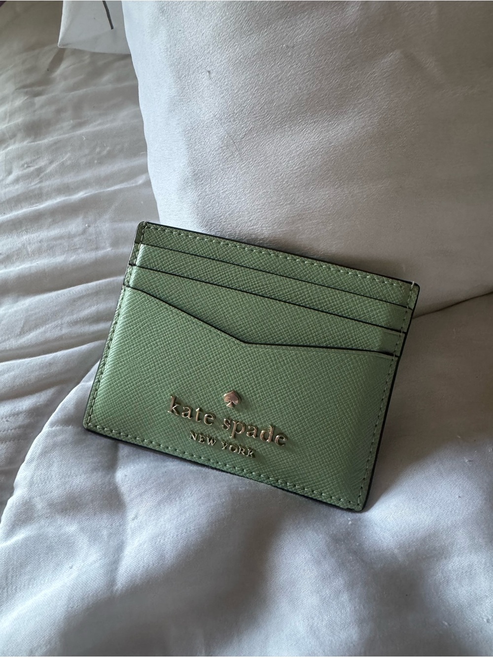 kate spade mint green card holder with pink dust bag